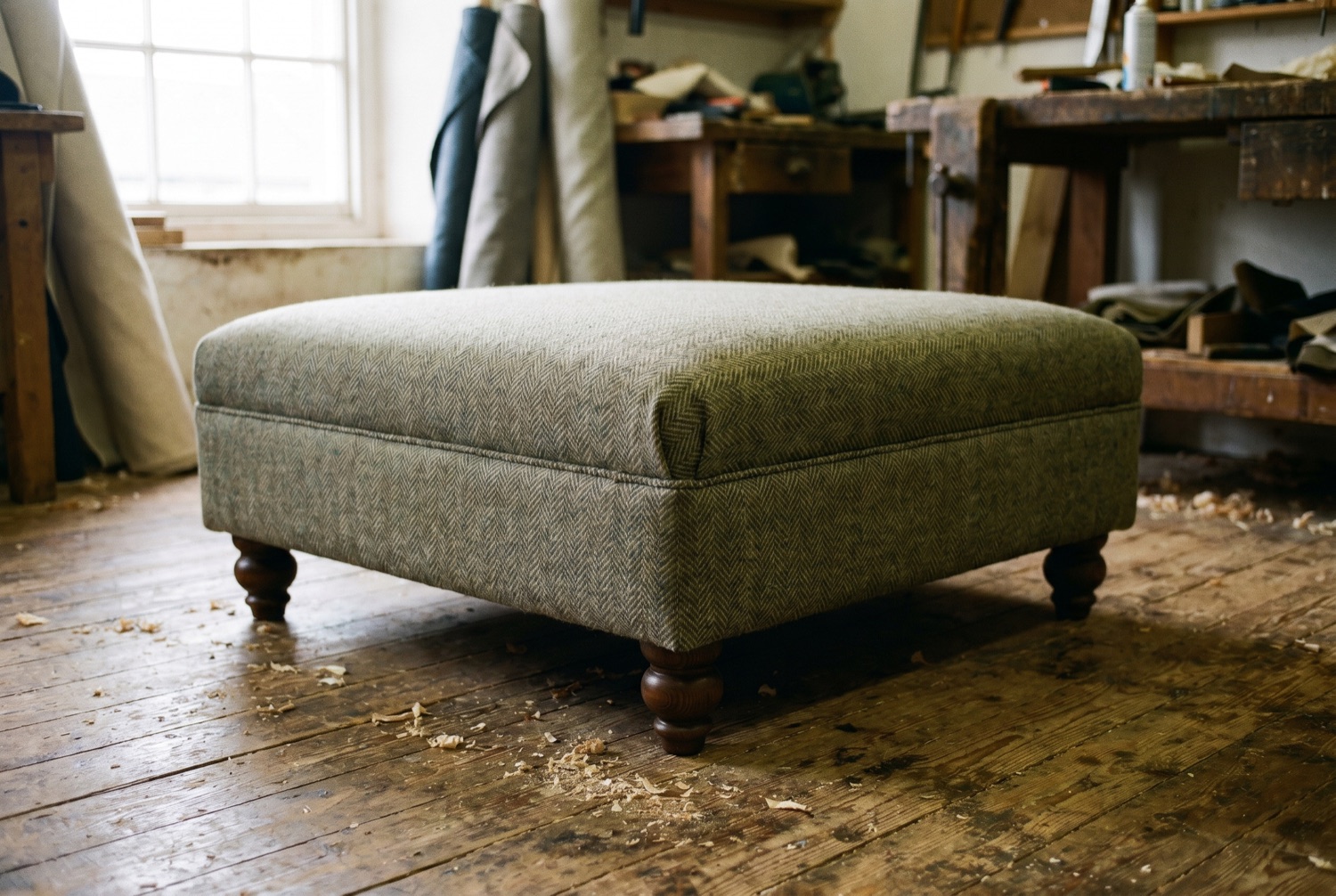 The same footstool recovered in herringbone tweed